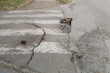 Rupa na ulasku na parking između Pazinske 17 i Pazinske 15