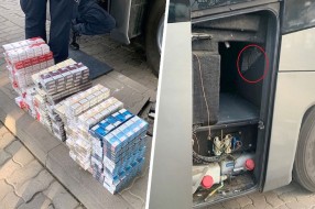 Prepravljeni rezervoar autobusa pun cigareta