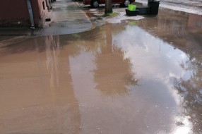 Poplava do pola ulice nakon malo veće kiše (Tavankutska ulica)