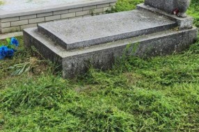 Košenje trave na Senćanskom groblju