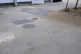 Nezavršeno krpljenje rupa (ispred zgrade u Šenoinoj 5)