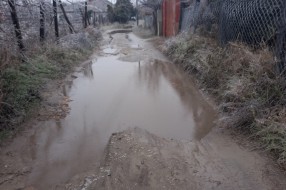 Ozrenska ulica neasfaltirana