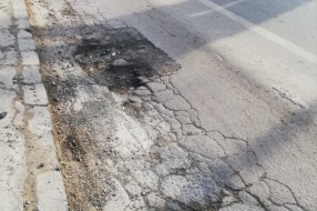 Rupa na kolovozu u Preradovićevoj ulici