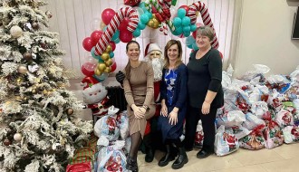 „Praznična čarolija solidarnosti: 240 paketića za dečje osmehe“