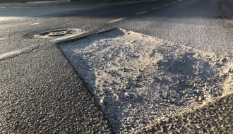 Nedovršeni i neobeleženi radovi na putu (Ulica Jovana Mikića)