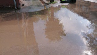 Poplava do pola ulice nakon malo veće kiše (Tavankutska ulica)