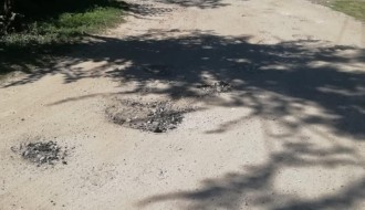 Mnogo udarnih rupa, otežana vožnja (Željezničko naselje)