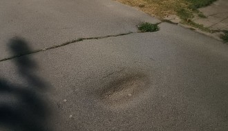 Ulegnuti asfalt u Vidovdanskoj ulici