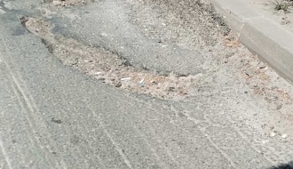 Udarna rupa na Beogradskom putu, preko puta Kerske crkve