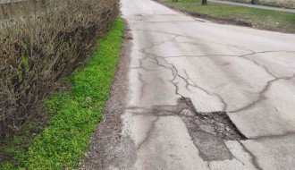 Udarna rupa u ulici Luke Sučića