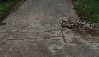 Stanje asfalta u Ulici Save Kovačevića u Starom Žedniku