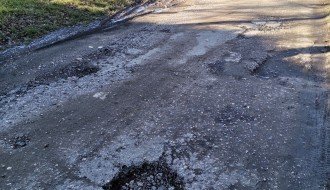 Rupe pored vrtića u ulici Antona Aškerca