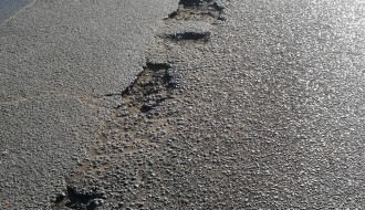 Oštećen kolovoz kod Blaškovog križa