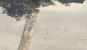 Rupa celom širinom puta u Ulici Mirka Bogovića