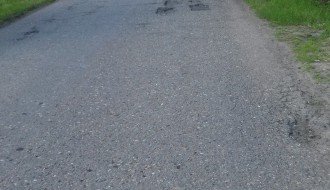 Udarne rupe na putu u ulici Starine Novaka