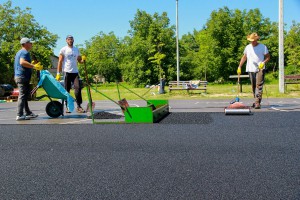Postavljanje tartan podloge na sportski teren