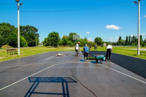 Postavljanje tartan podloge na sportski teren