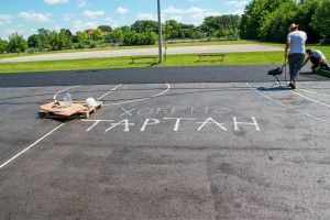 Postavljanje tartan podloge na sportski teren