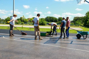 Postavljanje tartan podloge na sportski teren